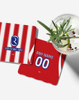 Coaster with the Atlético Madrid 2026-27 Home football shirt design by RIPA Football