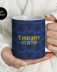 Mug with the Arsenal 2026-27 Away football shirt design by RIPA Football