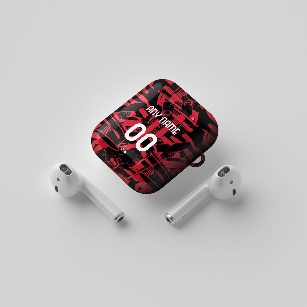 AirPods case with the AC Milan 2026-27 Prematch football shirt design by RIPA Football